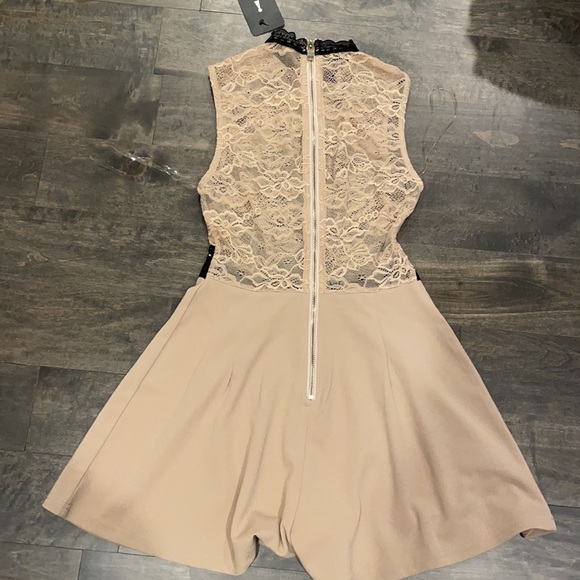 Boutique lace romper. New w/ TAG - Picture 2 of 3